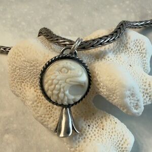 Intricate Silver and Cream Eagle Pendant Charm